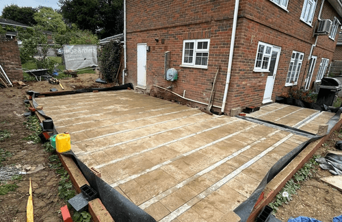 Wrap-Around Extension with Porcelain Patio — photo 2